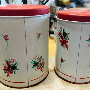 Vintage red roses metal canisters, set of 2. Good condition for their age.